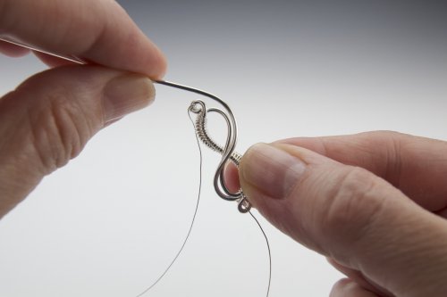 Susan Barzacchini's Infinity Rose Wire Bracelet - Completing the Infinity Frame, Contemporary Wire Jewelry, Coiling, Coiling Wire, Wire Coiling, Following the previous S wave